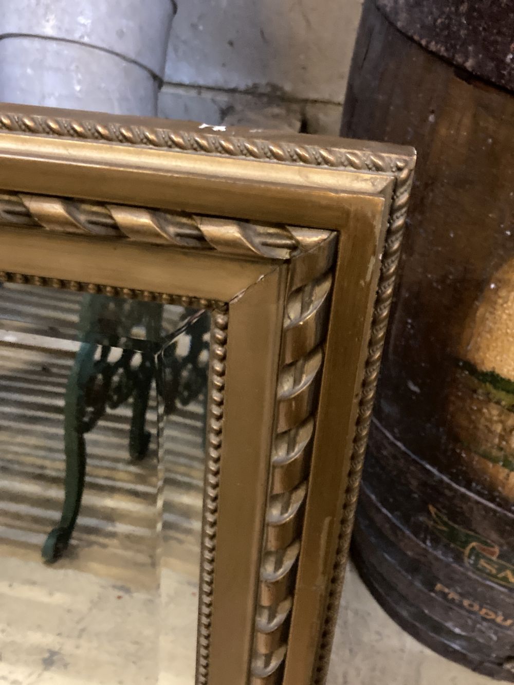 A modern gilt carved wood framed landscape wall mirror, width 116cm height 79cm